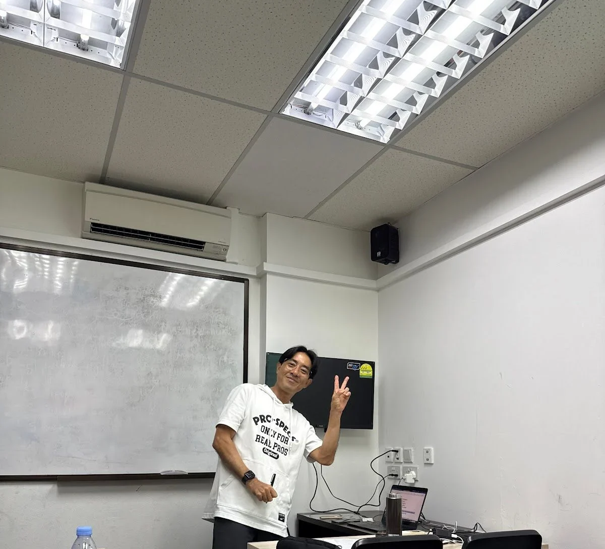 A Korean Explorer teacher at the whiteboard