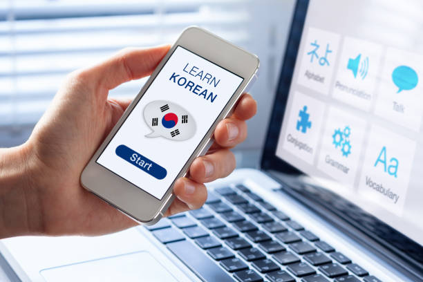Learn Korean language online concept, mobile phone, flag South Korea