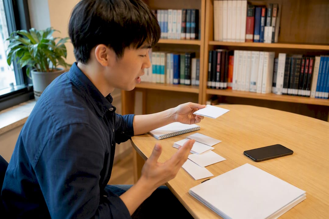 Learner speaking Korean with flashcards