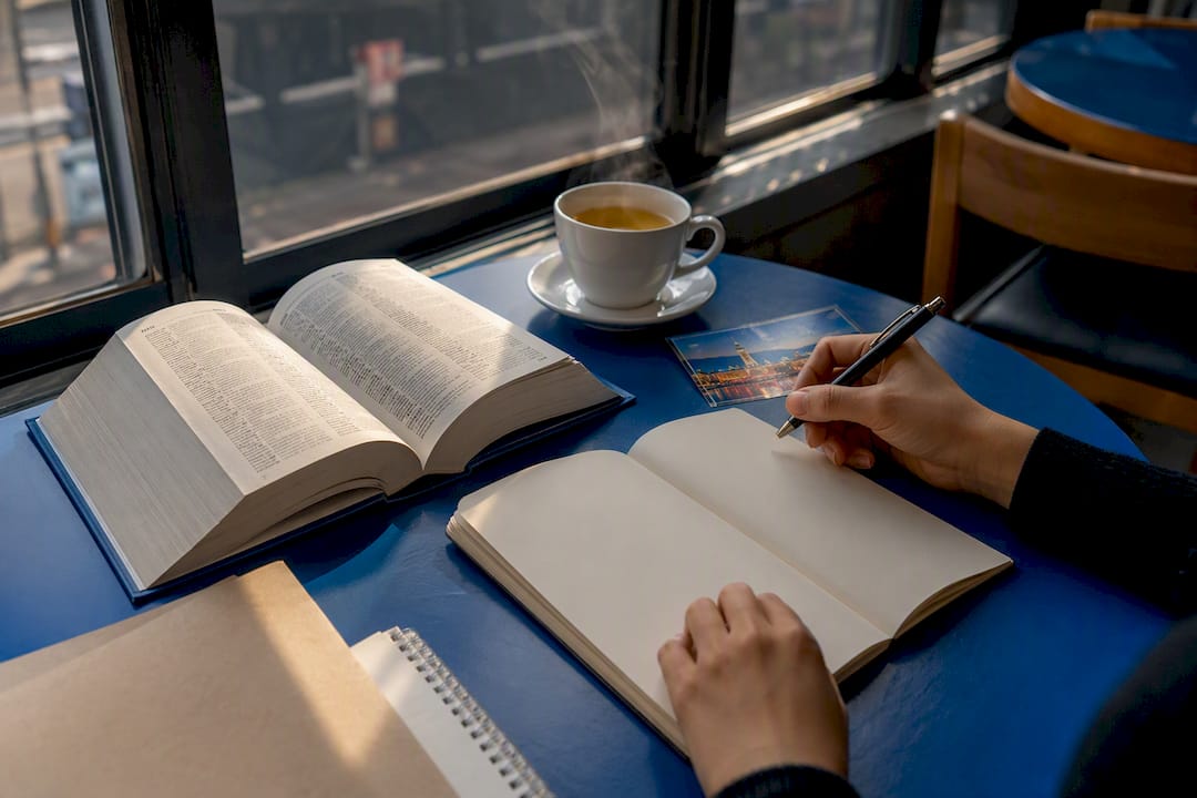Korean language study materials on wooden desk