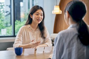 Learner practising Korean conversation with instructor