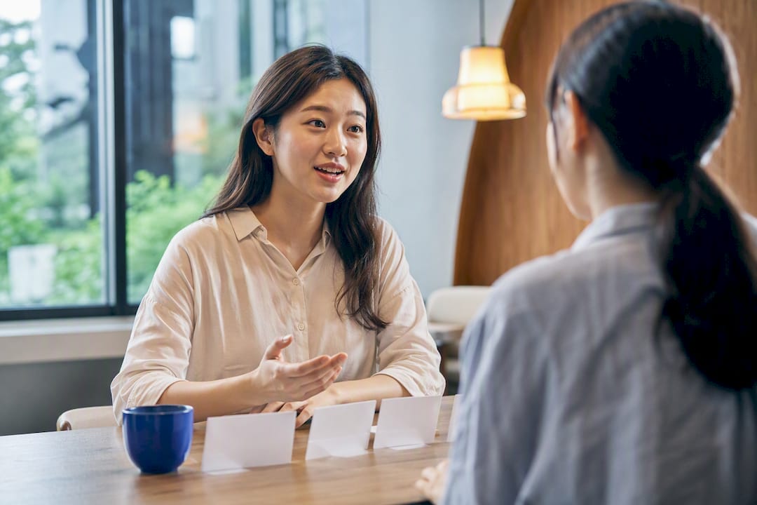 Learner practising Korean conversation with instructor