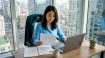 Woman reviewing business Korean contract in city office