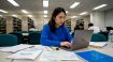 TOPIK candidate registering at university library table