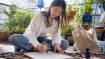 Woman practicing writing Hangul characters