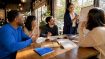 Diverse adult learners in language class discussion