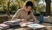 Woman studying Korean for TOPIK exam
