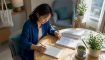 Adult Korean learner studying curriculum alignment