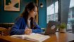 Singapore learner studying Korean on laptop